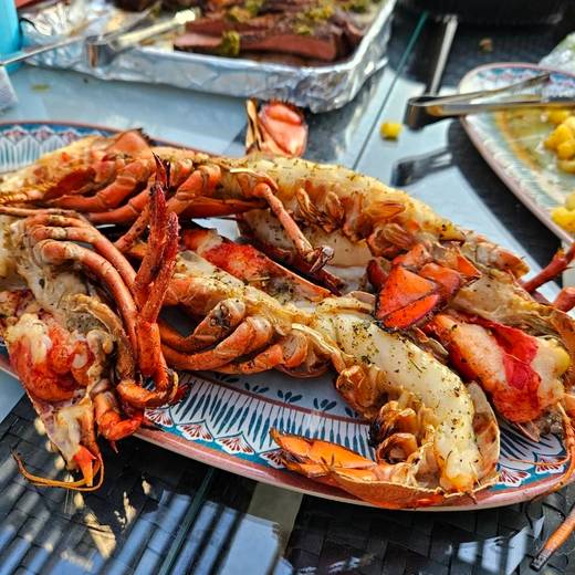 Grilled lobster on a platter at an event